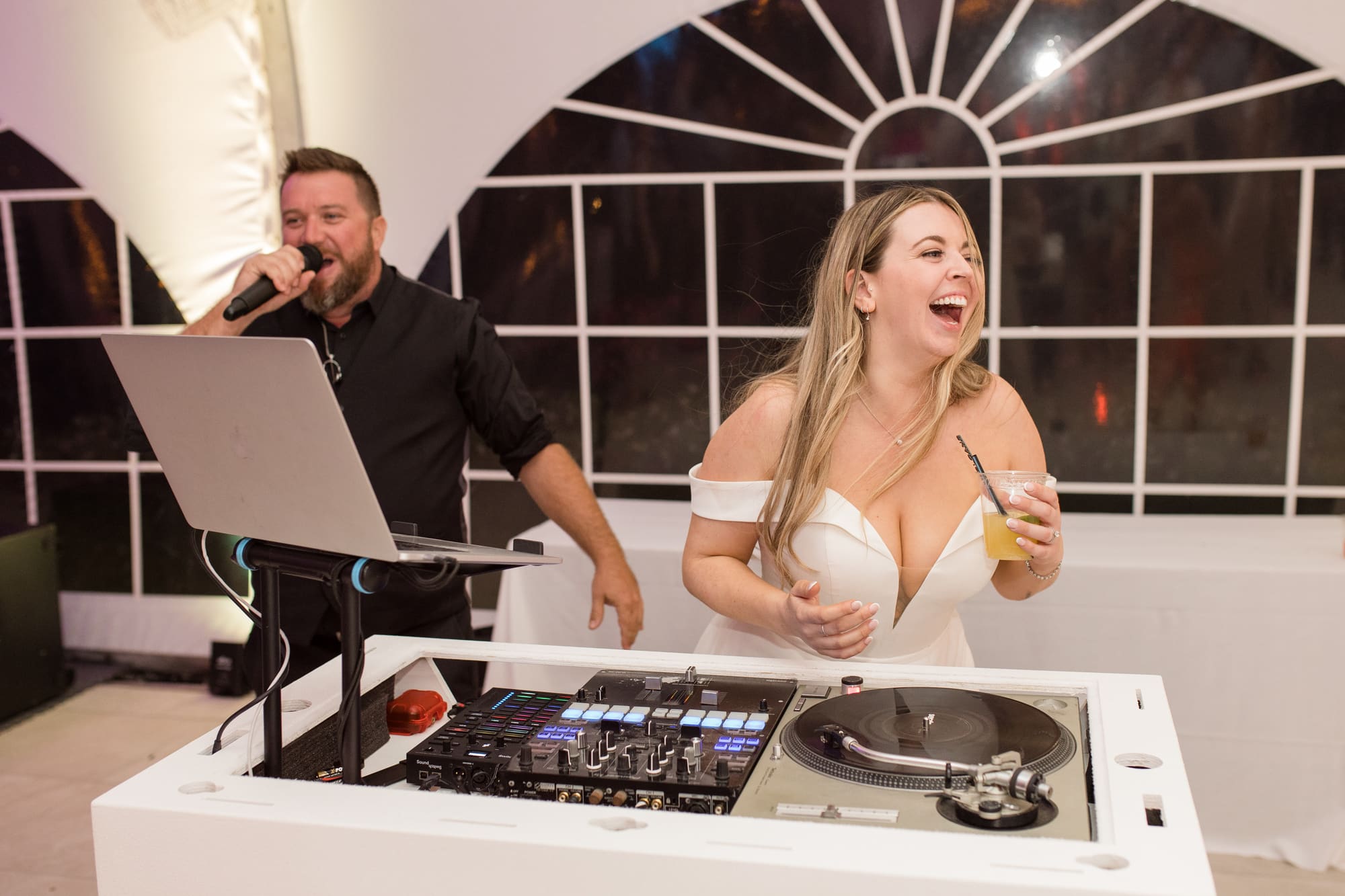 DJ MadMike behind the booth at a Florida wedding reception